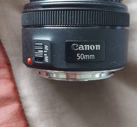 Canon 5D Mark III with 50 mm lens two batteries and a charger