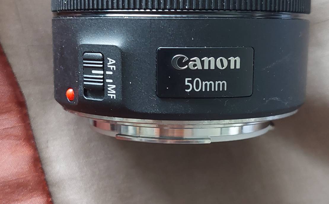 Canon 5D Mark III with 50 mm lens two batteries and a charger