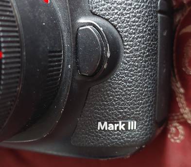 Canon 5D Mark III with 50 mm lens two batteries and a charger