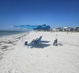 4 beach chairs  2 solbello shades, 1 beach dolly, 1 cooler, 1 Bluetooth speaker.