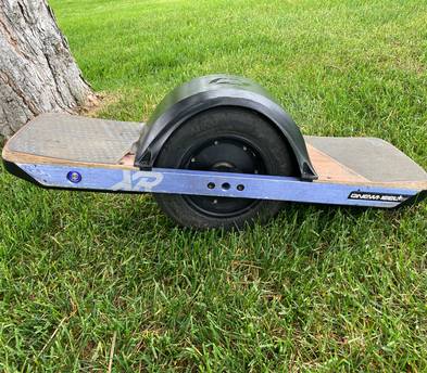 Onewheel XR+ With fender and treaded tire.