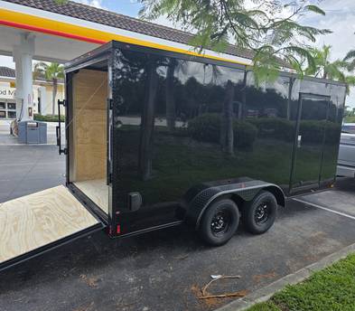 7x16 enclosed trailer  w/ ramp door
