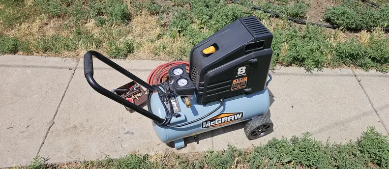 McGraw 8 gallon 150 PSI air compressor with hose and accessories
