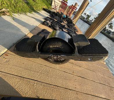 Tricked-Out Off-Roading Onewheel XR with Extended Range CBXR Battery (40+ Mile Range), Lift-Kit, Treaded Tire, Extended Flight Fins, Fangs, Pro-Ride Concave Footpads, Bumper Plates, Full Body Pads + More