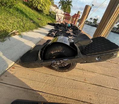 Tricked-Out Off-Roading Onewheel XR with Extended Range CBXR Battery (40+ Mile Range), Lift-Kit, Treaded Tire, Extended Flight Fins, Fangs, Pro-Ride Concave Footpads, Bumper Plates, Full Body Pads + More
