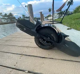 Tricked-Out Off-Roading Onewheel XR with Extended Range CBXR Battery (40+ Mile Range), Lift-Kit, Treaded Tire, Extended Flight Fins, Fangs, Pro-Ride Concave Footpads, Bumper Plates, Full Body Pads + More