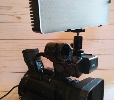 Giotto Professional Tripod with adjustable, bright,  dual color film light