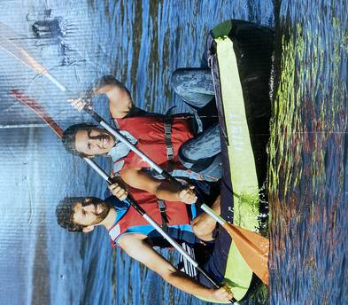 Tandem inflatable kayak w/ 2 oars & 2 life vests