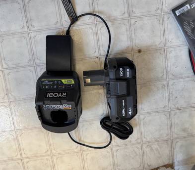 This is a Ryobi 18+ volt battery and charger.