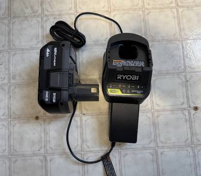 This is a Ryobi 18+ volt battery and charger.