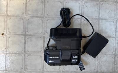 This is a Ryobi 18+ volt battery and charger.