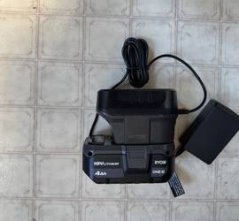 This is a Ryobi 18+ volt battery and charger.