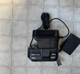 This is a Ryobi 18+ volt battery and charger.
