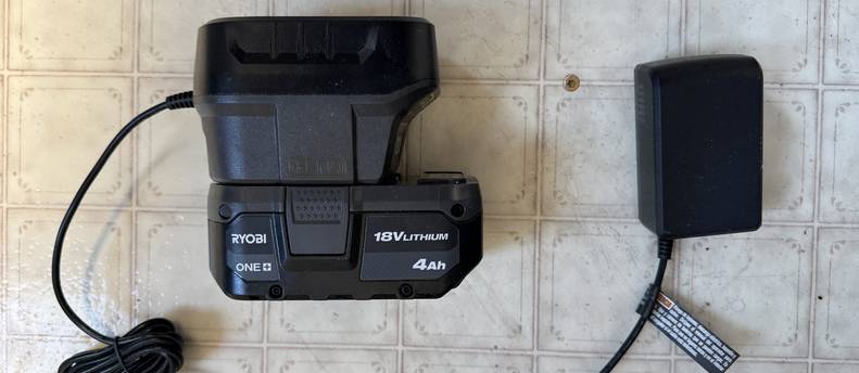 This is a Ryobi 18+ volt battery and charger.