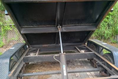 U dump for rent per day or by weekly 6*12*2 ready to roll.  Heavy duty chains n axles solid floor no seem back doors lock when u dump easy operatable up down remote. 2 5/16 ball