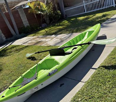 10 foot sit on top kyak. Life vest, paddle.