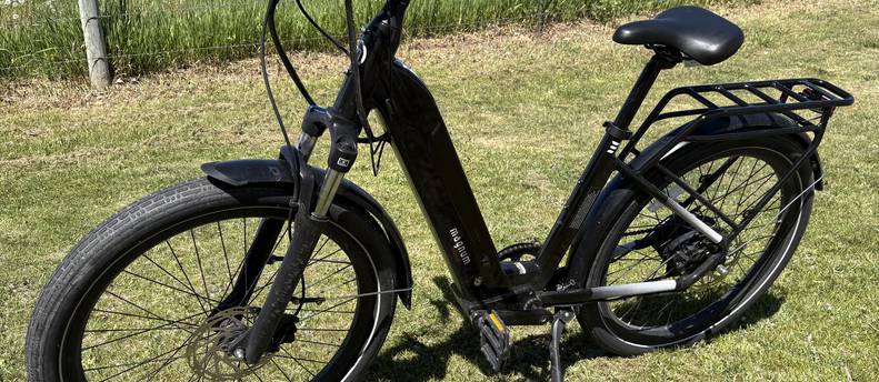 Magnum Cosmo E bike with 50 mile max range depending on throttle usage.