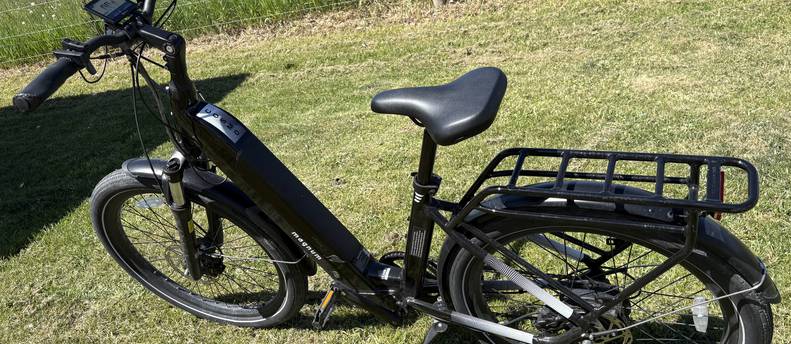 Magnum Cosmo E bike with 50 mile max range depending on throttle usage.
