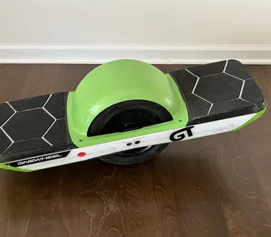Onewheel GT +fast charger (PEV) with soft ride tire and cushioned footpads