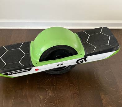 Onewheel GT +fast charger (PEV) with soft ride tire and cushioned footpads