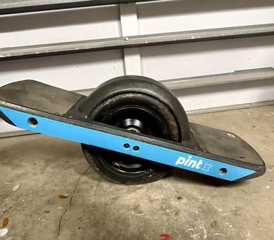 Onewheel Pint X w/helmet and wrist guards