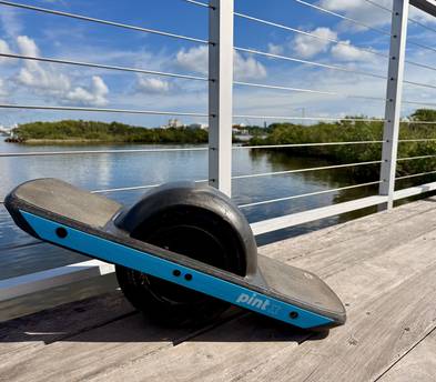 Onewheel Pint X w/helmet and wrist guards