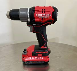 Cordless drill/driver with drill bits and extra battery
