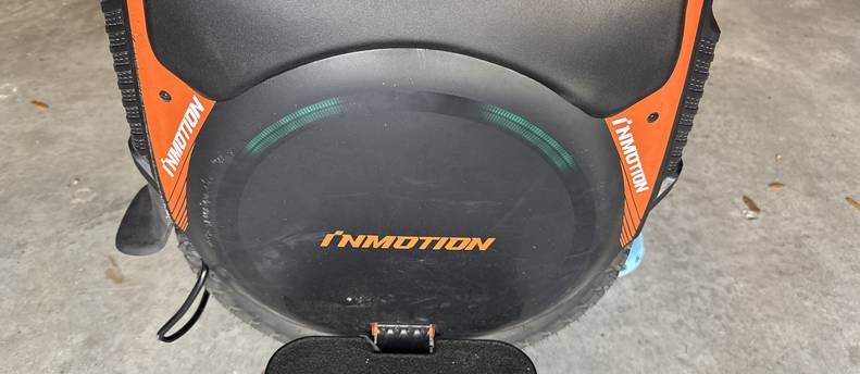 inmotion V12 electric unicycle. up to 34 mph and can go up to 100 miles per charge. has bluetooth speaker and lights
