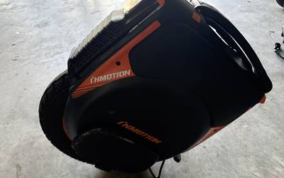 inmotion V12 electric unicycle. up to 34 mph and can go up to 100 miles per charge. has bluetooth speaker and lights
