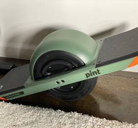 OneWheel pint, Triple 8 Adult size L helmet and Triple 8 size L wrist guards included.